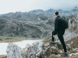 Professional embracing adventure and personal growth beyond the boardroom